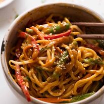 Noodle Salad with creamy Peanut Sesame Dressing in a bowl, ready to be eaten