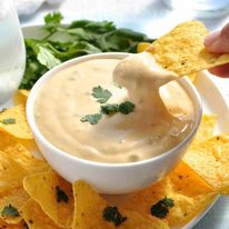 This dip does not harden when cooled, and doesn't split when reheated. Just 5 min to make, without using processed cheese. #dip #cheese #nachos #sauce
