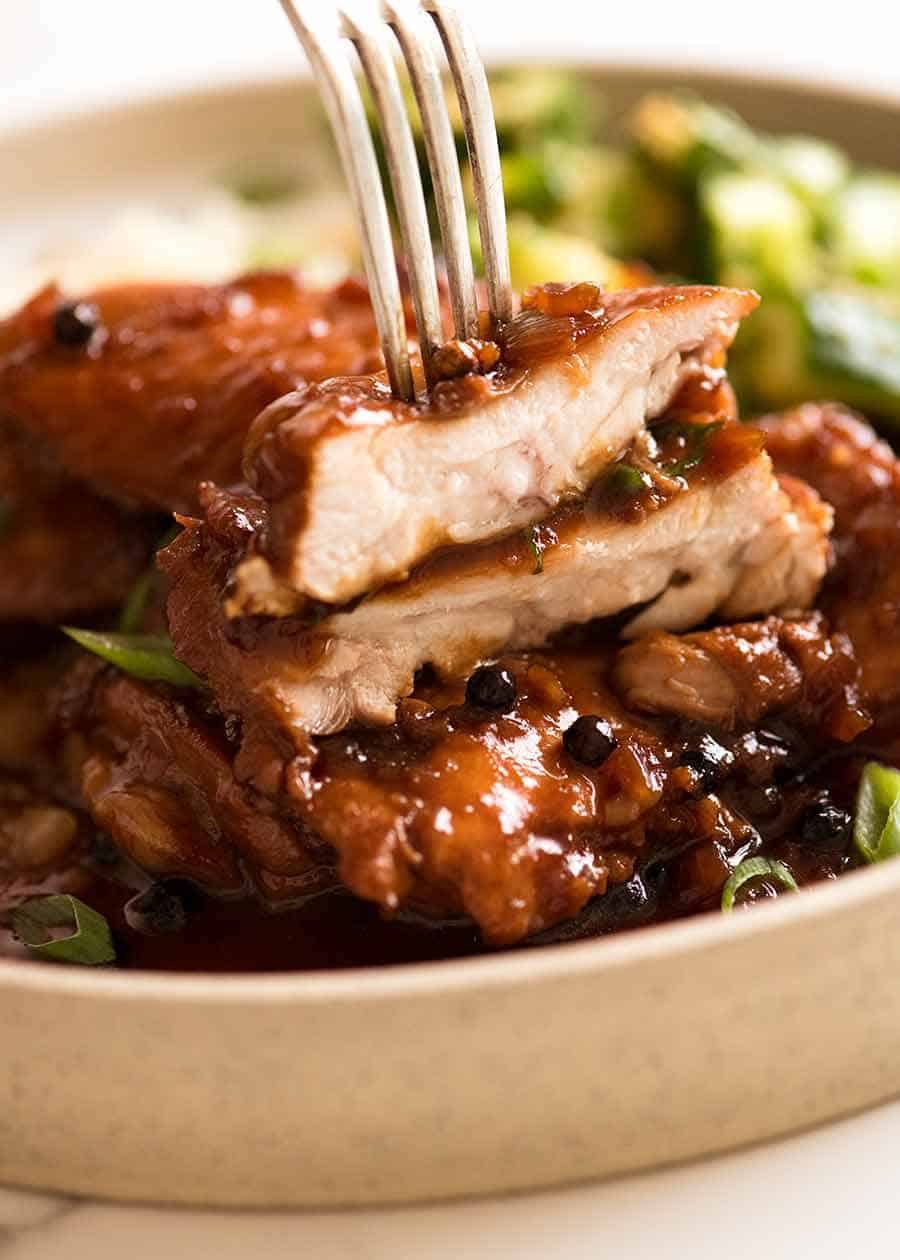 Close up showing juicy inside of Filipino Chicken Adobo