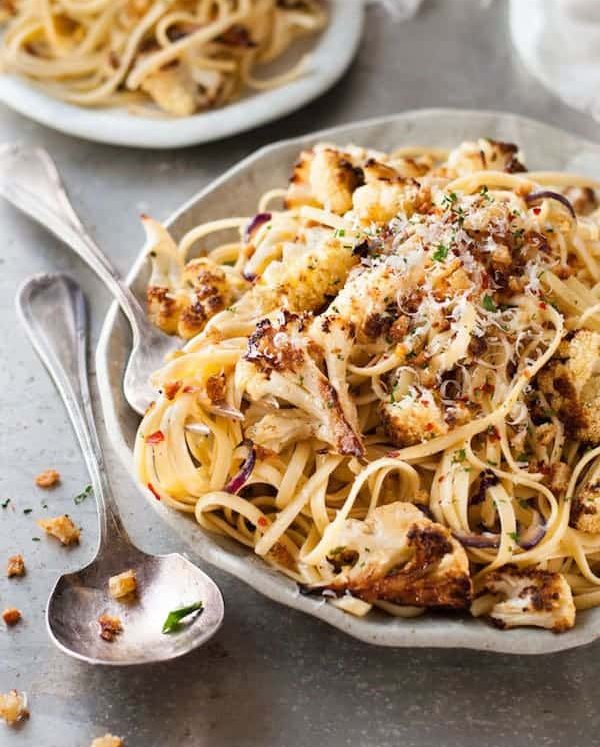 Garlic Butter Cauliflower Pasta with Pangritata toasted breadcrumbs on a plate, ready to be served.