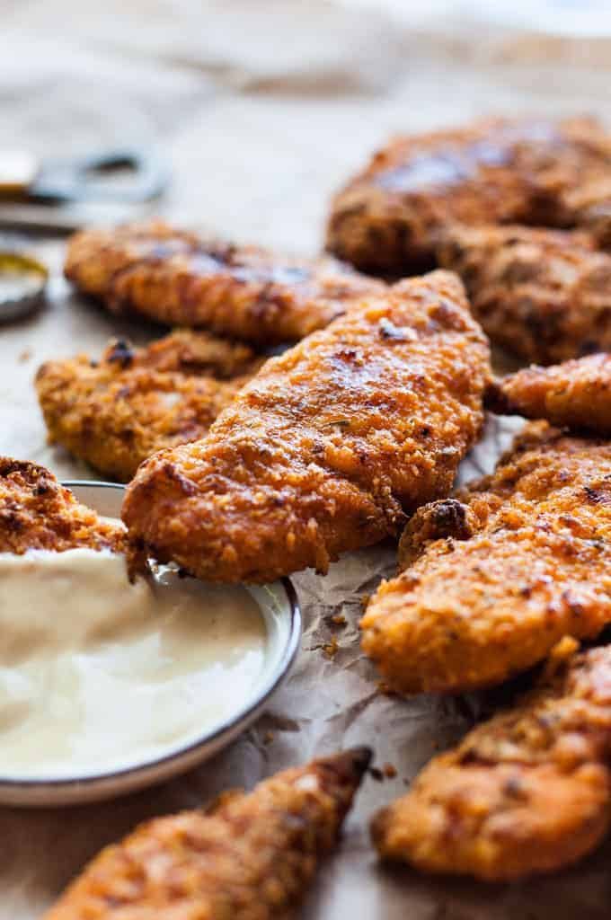 Oven Fried Chicken Tenders - tastes just like KFC, with a crunchy coating, 11 Secret Herbs & Spices and a fraction of the calories! recipetineats.com