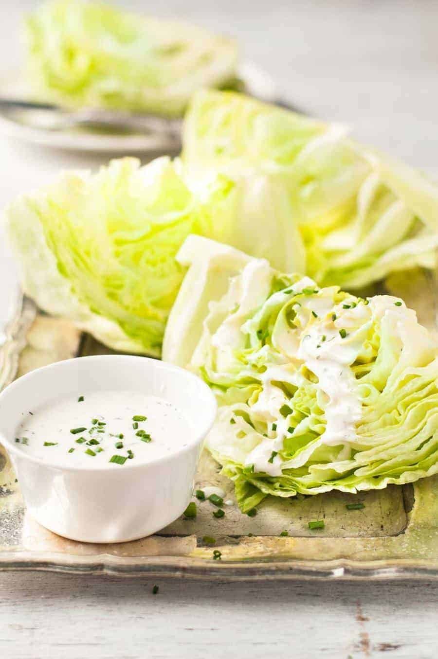 Closeup of Lettuce Wedge Salad with Ranch Dressing