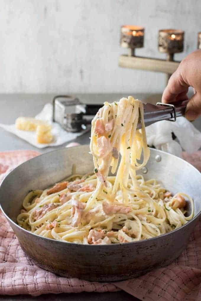 Salmon Alfredo Pasta - Fettuccine tossed in a creamy parmesan sauce and salmon, a magic combination!