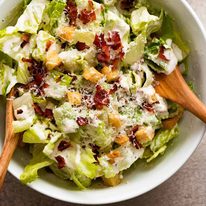 Caesar Salad in a white bowl, ready to be served