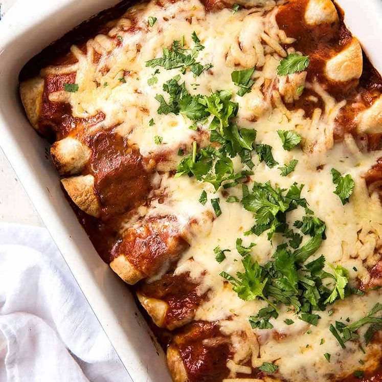Overhead photo of Beef Enchiladas, fresh out of the oven