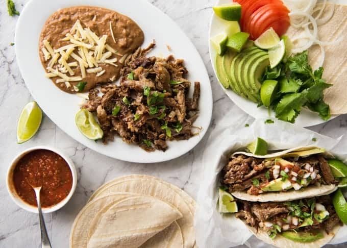 Mexican Pulled Pork Tacos - the juiciest, easiest, most flavoursome Pork Carnitas you will ever make! recipetineats.com