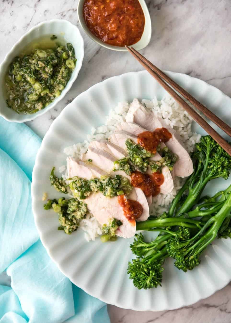 Extra juicy perfect Poached Chicken Breast guaranteed to work every single time! This technique is so easy, it will blow your mind. Served with a gorgeous Ginger Scallion (Shallot) Sauce. recipetineats.com