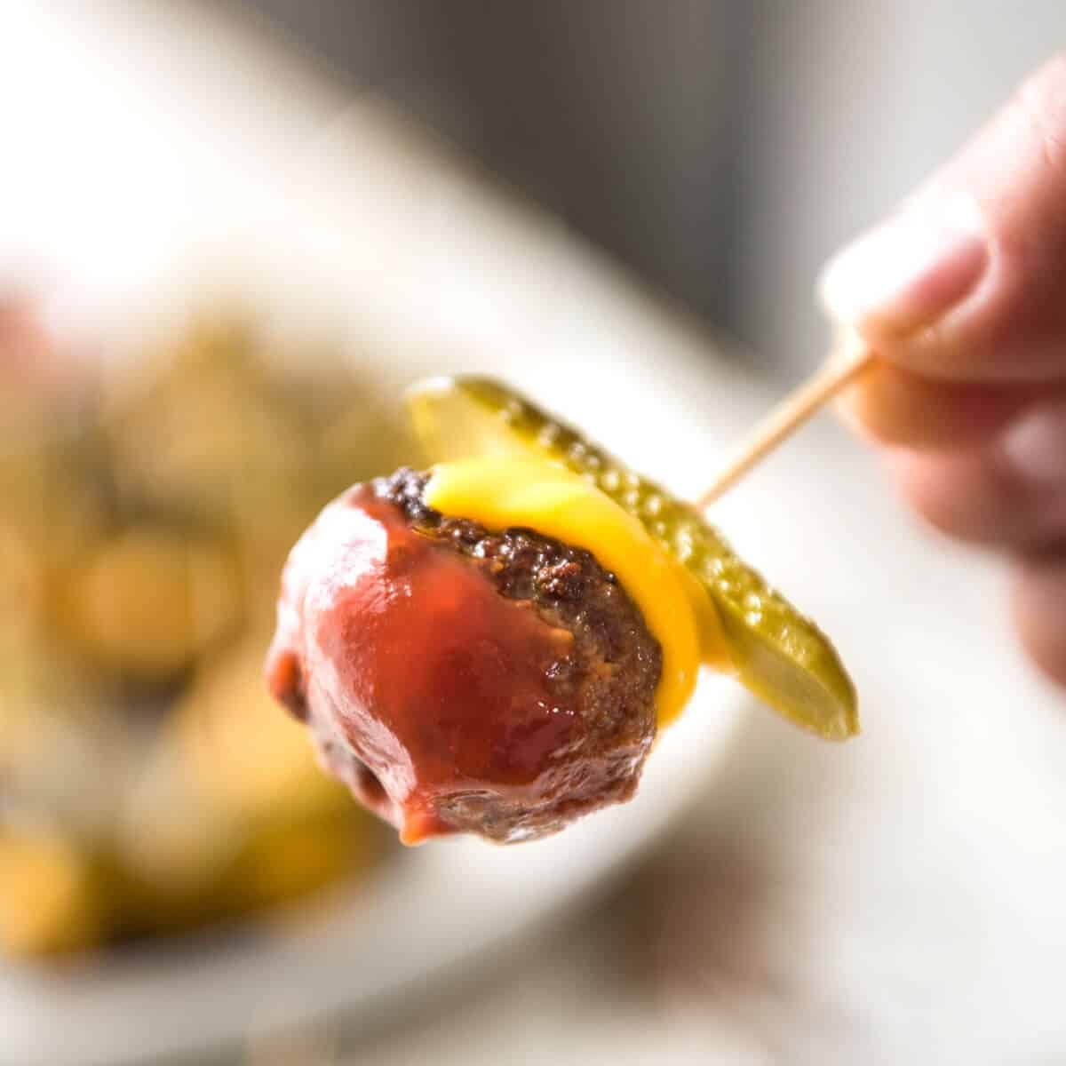 Cheeseburger Party Meatballs - tastes like a cheeseburger, in bite size form! Great for making ahead - fully assemble (inc toothpicks), 90 sec reheat in microwave. www.recipetineats.com