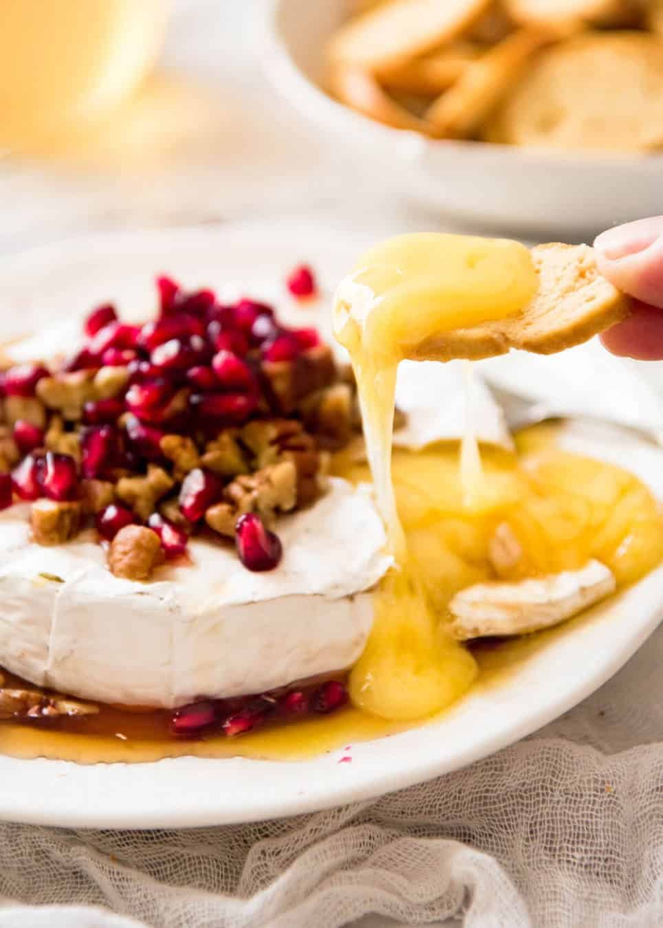 3 Minute Melty Festive Brie - Just microwave for 1 minute and you have an almost-instant baked brie appetizer! recipetineats.com