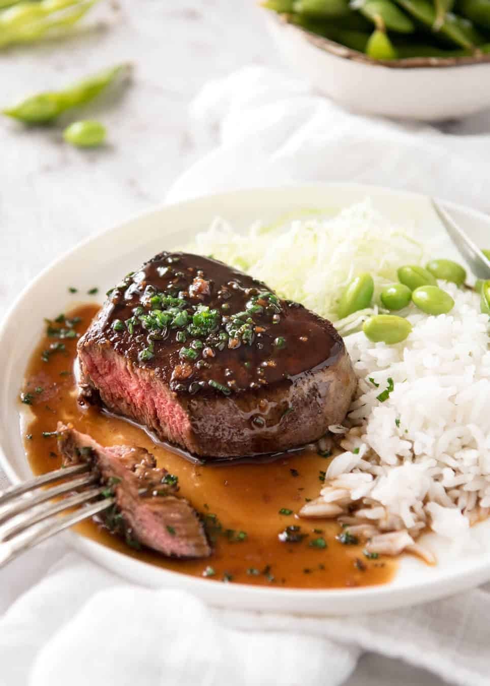 Simple yet stunning Asian Steak with a sauce inspired by the great Tetsuya! All you need is 15 minutes, soy sauce, mirin, sake or sherry, butter, garlic and ginger. Amazing! www.recipetineats.com