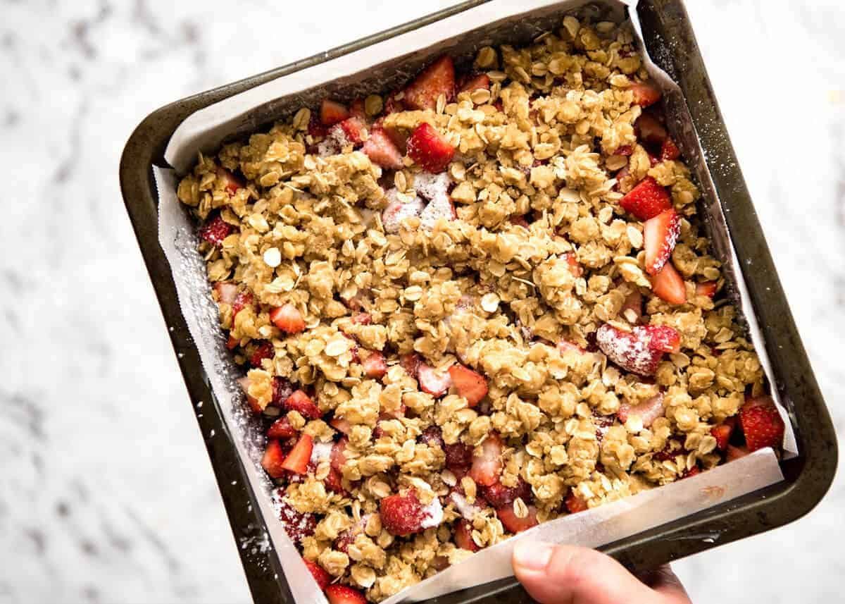 Fresh Strawberry Bars with a buttery biscuit base, topped with jam, fresh strawberries and a crumbly topping. No mixer, quick to make! www.recipetineats.com