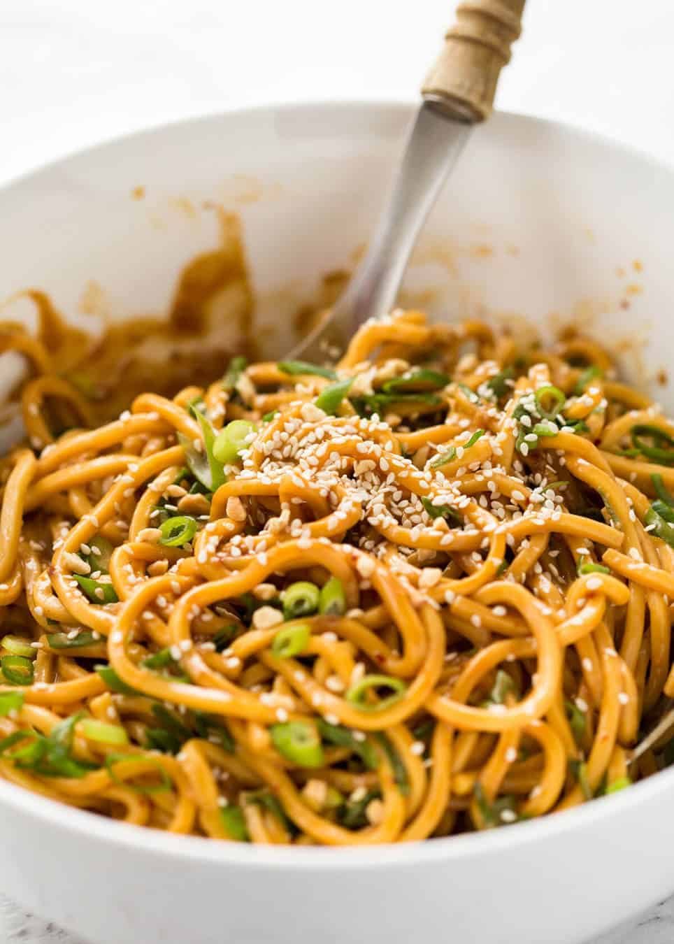 Sesame Noodles - noodles tossed with a wicked Asian Sesame Peanut Dressing. Serve these as Cold Sesame Noodles or warm. www.recipetineats.com