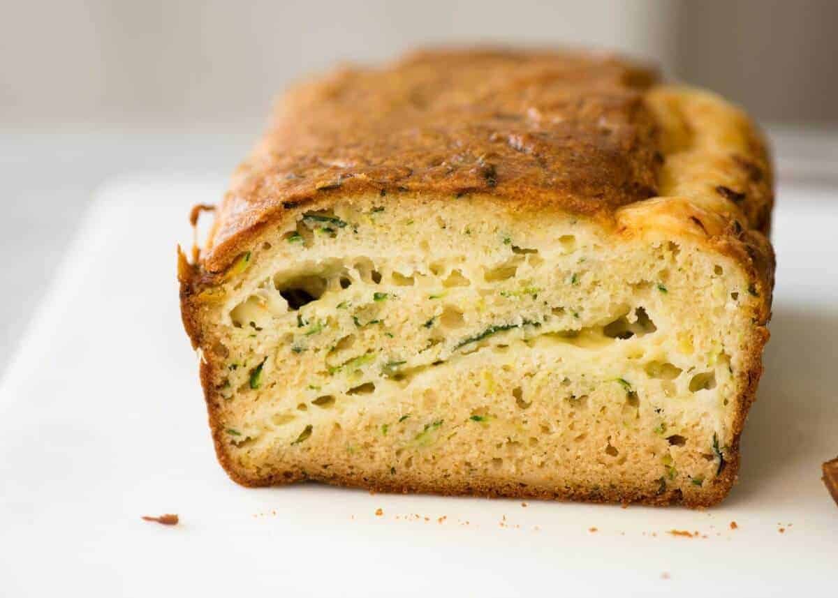 A Cheesy Zucchini Bread that's quick to make (no yeast) and is so moist, you'll scoff it down even without slathering it with butter! www.recipetineats.com