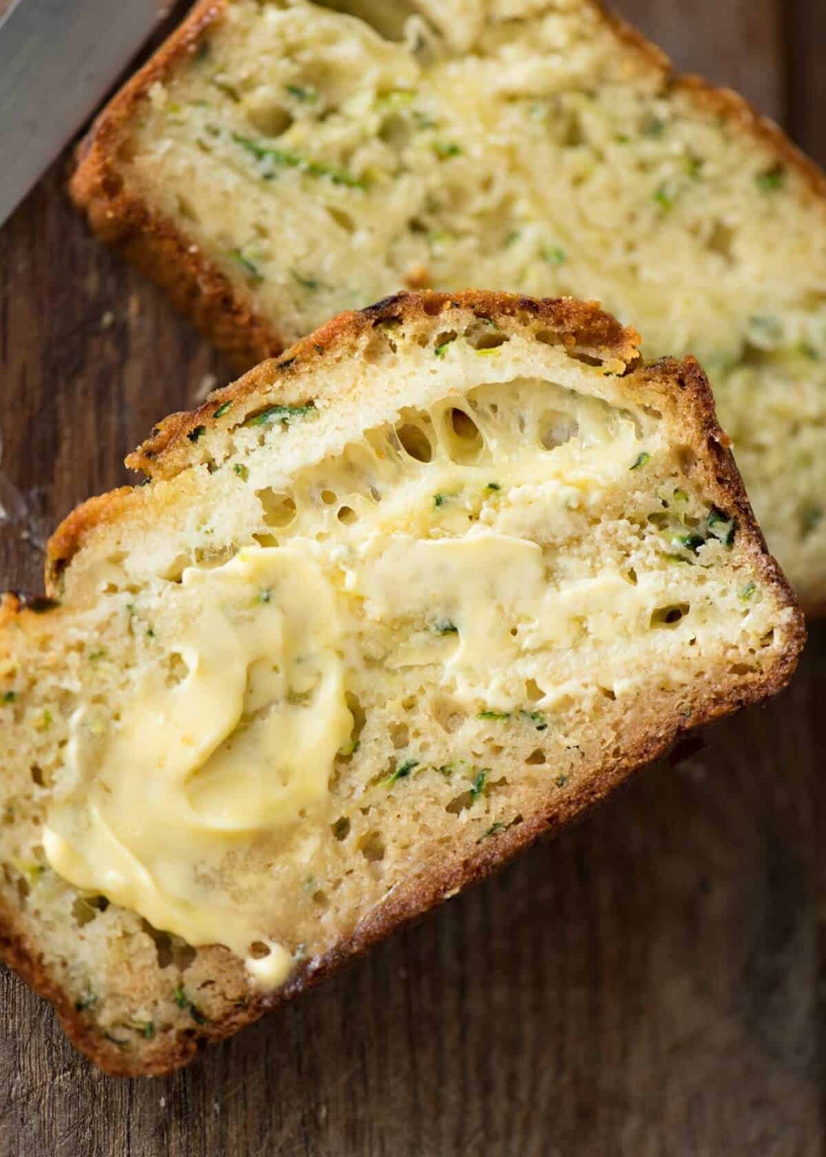 A Cheesy Zucchini Bread that's quick to make (no yeast) and is so moist, you'll scoff it down even without slathering it with butter! www.recipetineats.com