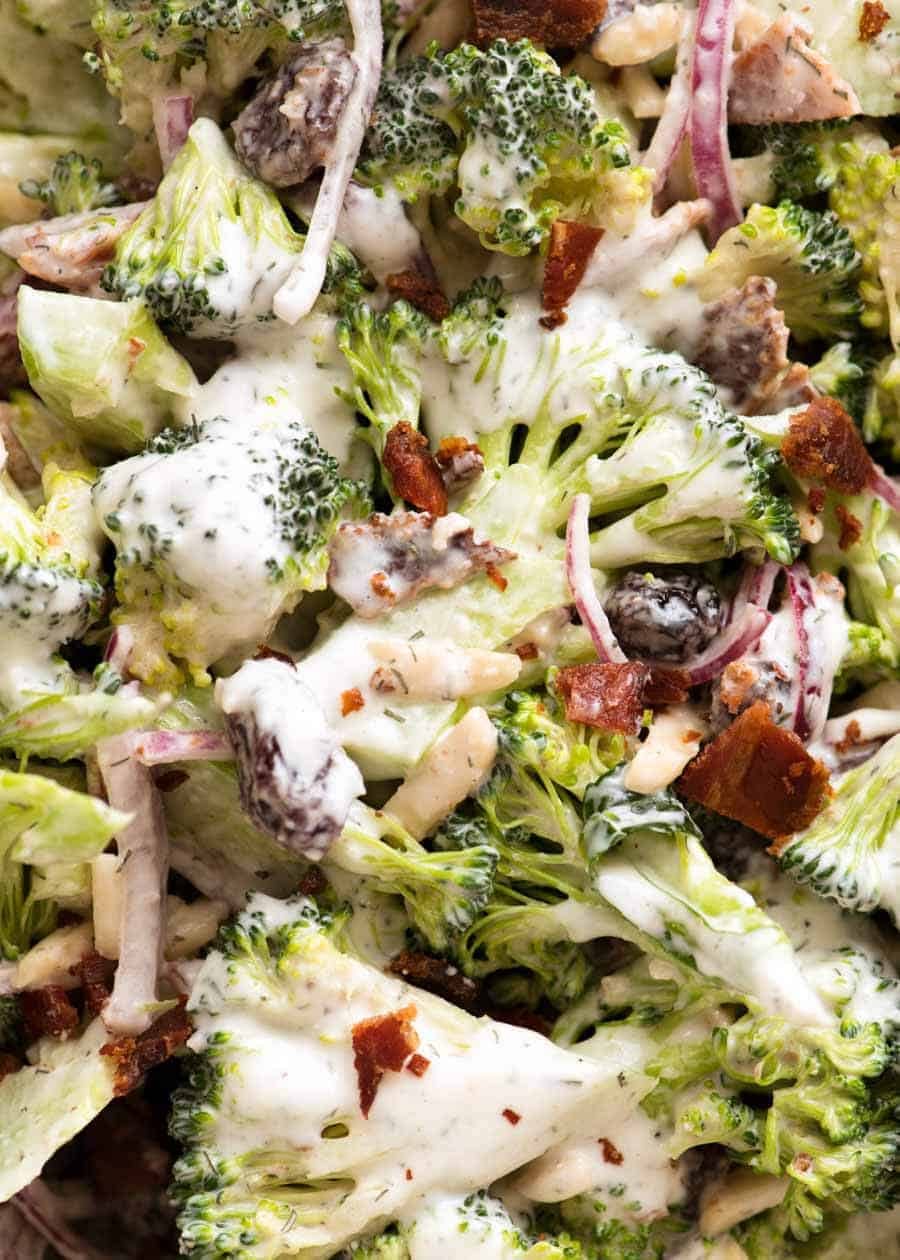 Close up of Broccoli Salad with Lighter Creamy Dressing with bacon, almonds, cranberries and red onion
