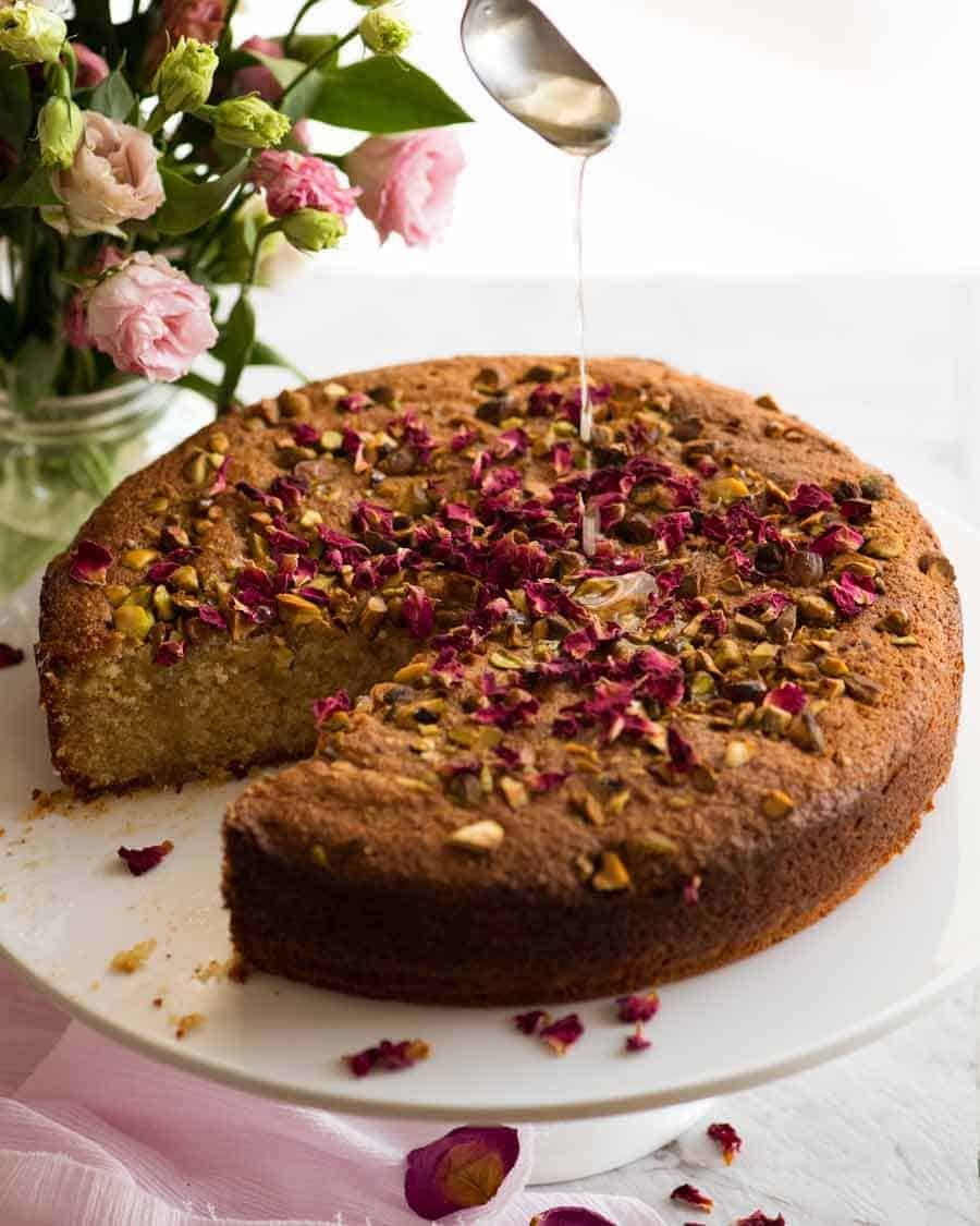 A beautiful Persian Love Cake made with semolina and almond meal soaked with a lemon syrup with a touch of optional rosewater.