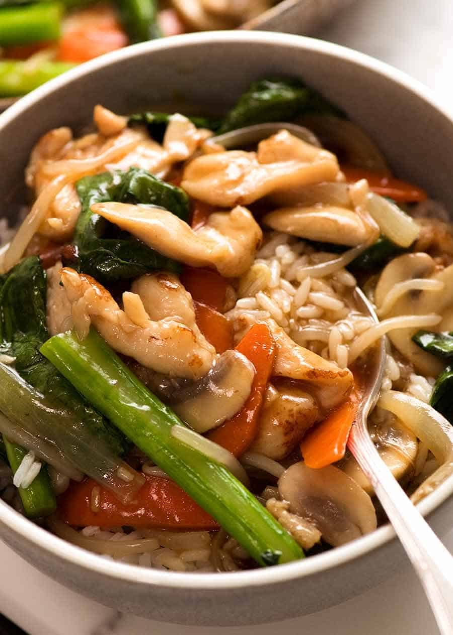 Close up of Chop Suey - Chicken Stir Fry served over white rice