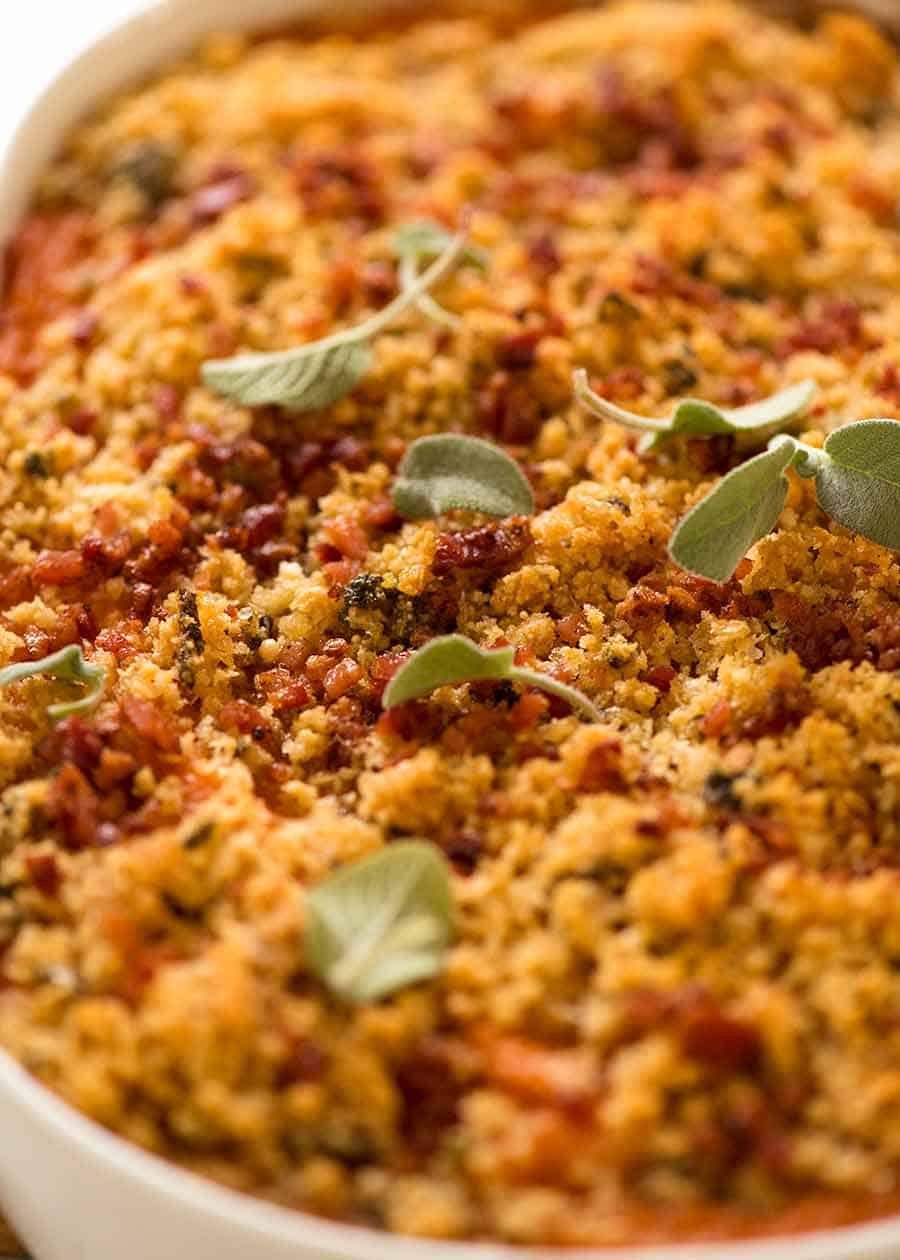 Close up of Browned Butter Sweet Potato Casserole crunchy parmesan topping