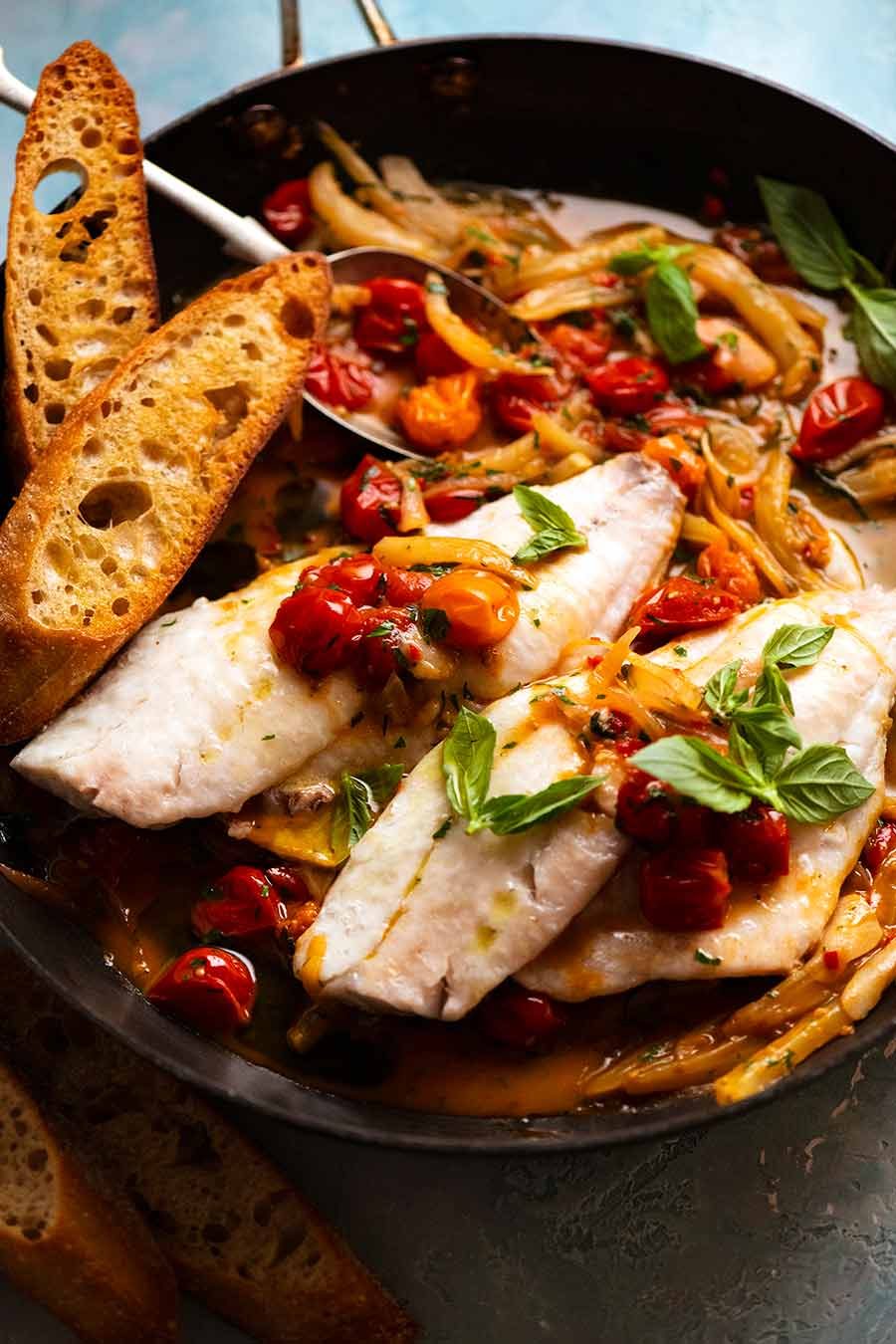 Acqua Pazza - Italian Poached Fish in a skillet, fresh off the stove