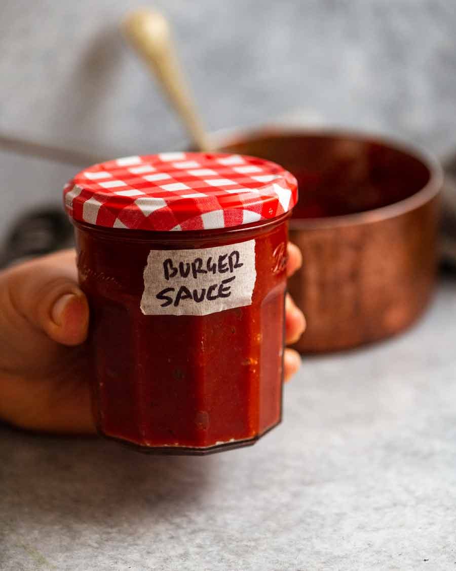 Quick tomato chutney burger sauce in a jar ready to be refrigerated