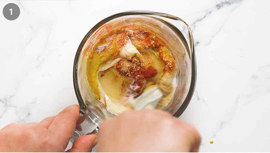 Mixing Special burger sauce for hamburgers