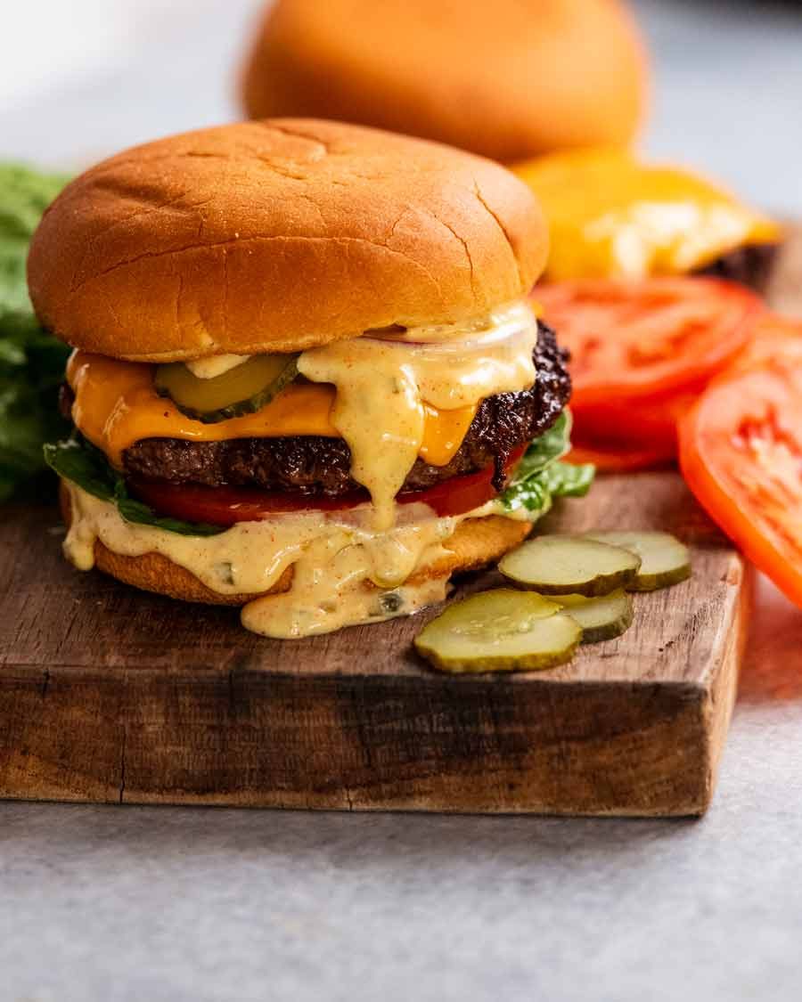 Cheeseburger with special burger sauce ready to be eaten