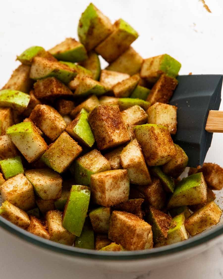 Tossing apples in cinnamon for Cinnamon Apple Bread