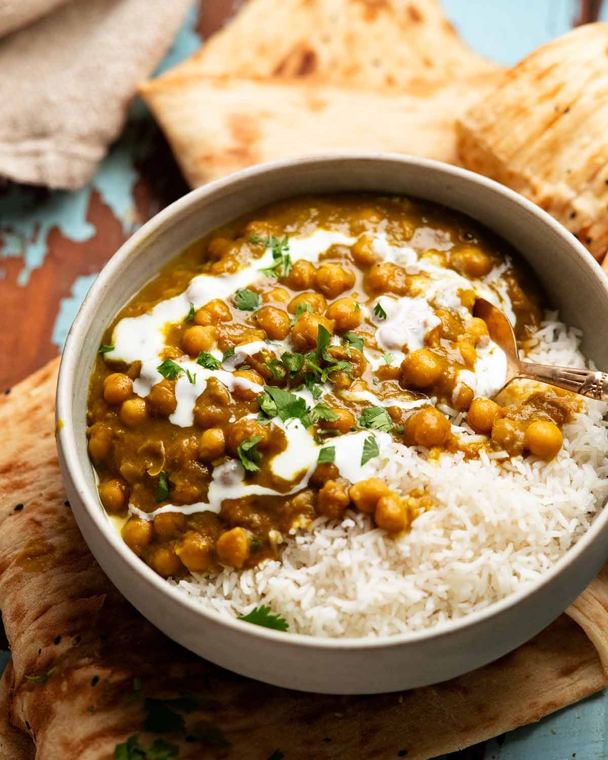 Afghani Chickpea Curry in a bowl over rice