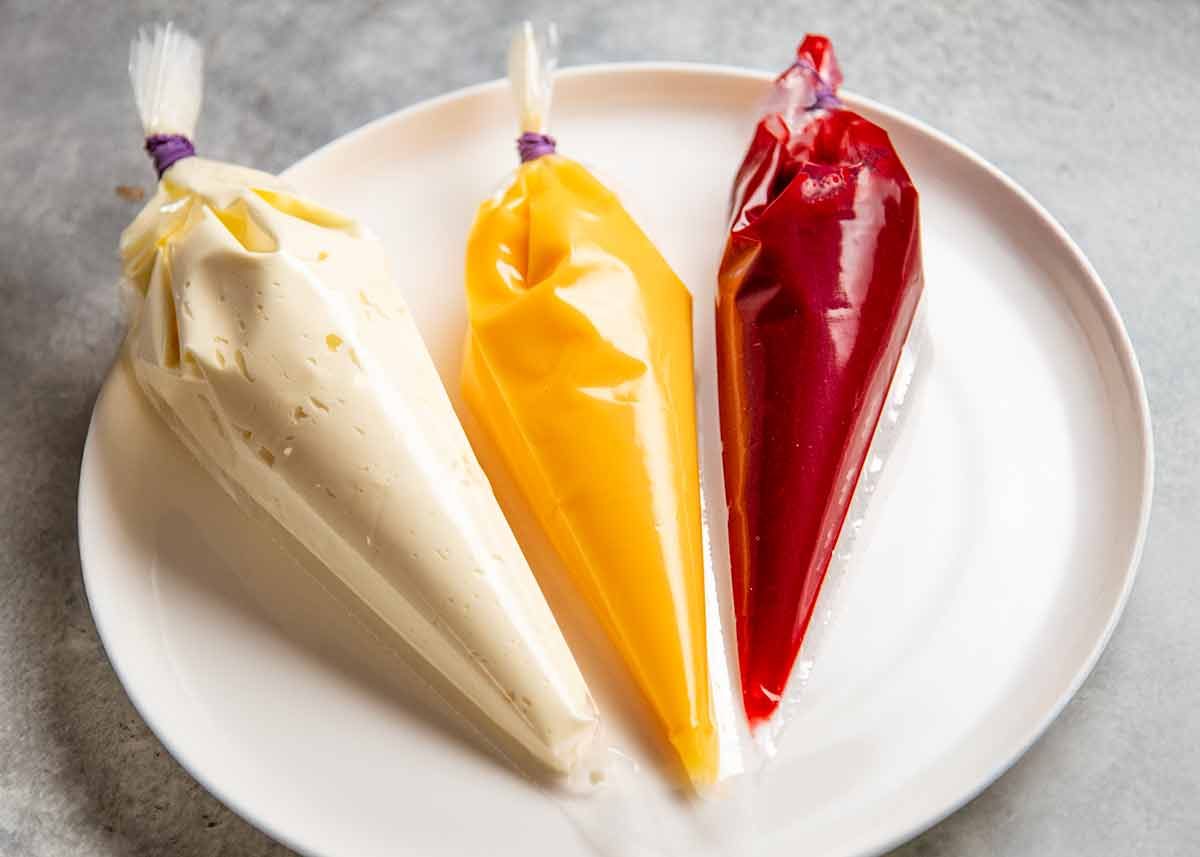 Pavlova Bomb Fillings - Raspberry Coulis, lemon curd, cream